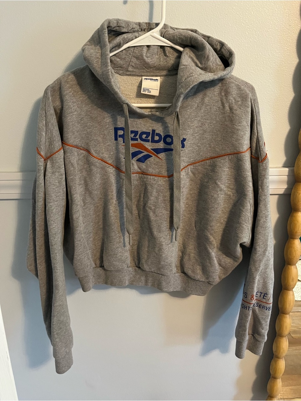 Reebok Gray Cropped Hoodie with Blue Logo and Orange Piping
